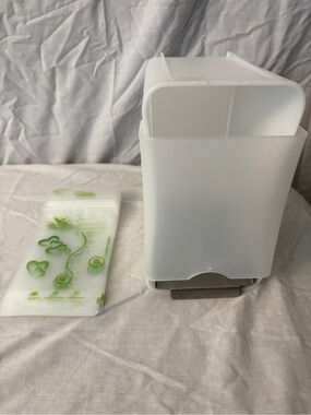 Breast milk freezer dispenser and bags